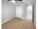 Bedroom with large closet and ceiling fan at 576 Prospect Pt, Oviedo, FL 32765
