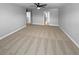 Spacious bedroom features neutral carpet and ceiling fan at 576 Prospect Pt, Oviedo, FL 32765