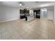 Spacious layout shows the kitchen, island, and stainless steel appliances at 576 Prospect Pt, Oviedo, FL 32765