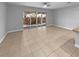Bright living space with a sliding glass door offering views of the backyard at 576 Prospect Pt, Oviedo, FL 32765