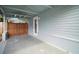 A covered carport provides sheltered parking and side entry to the home at 716 N Rockingham Ave, Tavares, FL 32778