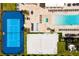 Aerial view showcasing a community tennis court, pool, and sand volleyball court at 7478 Brooklyn Dr, Kissimmee, FL 34747