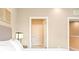 Bright bedroom featuring neutral tones and ensuite bathroom at 7478 Brooklyn Dr, Kissimmee, FL 34747