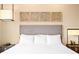 Inviting bedroom featuring decor, king bed with comfortable bedding and soft neutral decor at 7478 Brooklyn Dr, Kissimmee, FL 34747