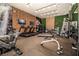 Community fitness center equipped with state-of-the-art cardio machines and weight training equipment at 7478 Brooklyn Dr, Kissimmee, FL 34747