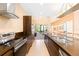 Stylish kitchen with modern appliances and island seating at 7478 Brooklyn Dr, Kissimmee, FL 34747