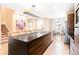 Sleek kitchen with a large island and modern lighting at 7478 Brooklyn Dr, Kissimmee, FL 34747
