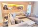 Inviting living room featuring a sectional sofa and stylish decor at 7478 Brooklyn Dr, Kissimmee, FL 34747