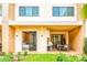 Inviting covered patio features a built-in grill, outdoor dining, and seamless indoor-outdoor living at 7478 Brooklyn Dr, Kissimmee, FL 34747