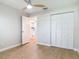 Bright bedroom with tile flooring, closet and doorway to the kitchen at 809 Sugar House Blvd, Port Orange, FL 32129