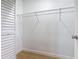 Walk-in closet with modern hanging rack and ample storage space at 809 Sugar House Blvd, Port Orange, FL 32129