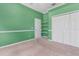 Bedroom featuring carpet, storage shelves, and a double door closet at 875 Bentley Green Cir, Winter Springs, FL 32708