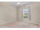 Cozy bedroom features carpet flooring, a ceiling fan, and a window at 875 Bentley Green Cir, Winter Springs, FL 32708