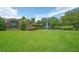 Beautiful Bentley Green entrance sign, lush landscaping, and a serene pond with a fountain create a welcoming atmosphere at 875 Bentley Green Cir, Winter Springs, FL 32708