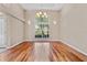 Elegant dining room featuring hardwood floors and a chandelier at 875 Bentley Green Cir, Winter Springs, FL 32708