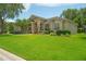 Lovely single-story home featuring lush greenery, a well-kept lawn, and charming curb appeal at 875 Bentley Green Cir, Winter Springs, FL 32708
