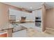 Stylish kitchen boasts granite countertops, stainless steel appliances and ample storage space at 875 Bentley Green Cir, Winter Springs, FL 32708