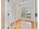Office with French doors, hardwood floors, ceiling fan, and natural light at 875 Bentley Green Cir, Winter Springs, FL 32708
