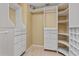 Custom closet with shelving, drawers, and ample storage space at 875 Bentley Green Cir, Winter Springs, FL 32708