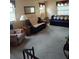 Inviting living room with comfortable seating and natural light, creating a warm and welcoming atmosphere at 8850 Pine Bay Ct, Orlando, FL 32825