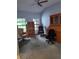 Comfortable office with natural light, built-in bookcases, and ample space for productivity and organization at 8850 Pine Bay Ct, Orlando, FL 32825
