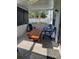 Relaxing screened patio with outdoor seating, perfect for enjoying the outdoors at 8850 Pine Bay Ct, Orlando, FL 32825