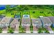 Aerial view showcasing the home's pool, spa, lush backyard, and proximity to the lake within the well-kept community at 9068 Sonoma Coast Dr, Winter Garden, FL 34787