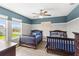 Charming bedroom with two beds, providing ample space for Gathering or guests at 9068 Sonoma Coast Dr, Winter Garden, FL 34787