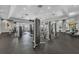Spacious fitness center with modern exercise equipment and plenty of natural light at 9068 Sonoma Coast Dr, Winter Garden, FL 34787