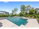Inviting pool and spa surrounded by mature landscaping and sun loungers providing a peaceful and private outdoor retreat at 9068 Sonoma Coast Dr, Winter Garden, FL 34787
