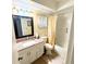 Bathroom featuring a vanity with granite countertop and a shower-tub combination at 1025 Sullivan St, Deltona, FL 32725