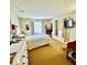 Bright bedroom with carpet, a window, and neutral décor for a relaxing ambiance at 1025 Sullivan St, Deltona, FL 32725