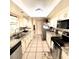 Efficient kitchen featuring modern appliances, granite countertops and ample cabinet space at 1025 Sullivan St, Deltona, FL 32725