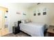 Comfortable bedroom featuring stylish decor and wood-look flooring at 1021 Jaybee Ave, Davenport, FL 33897