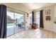 Bright dining area with tile floors, slider door to pool, and natural light at 1021 Jaybee Ave, Davenport, FL 33897