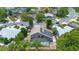 Home features solar panels, screened-in patio and well-maintained backyard landscaping at 1061 Providence Ln, Oviedo, FL 32765