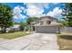 Charming two-story home with well-maintained lawn and inviting curb appeal at 1061 Providence Ln, Oviedo, FL 32765
