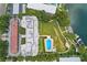 This is an aerial view of the apartment building showing the swimming pool and bay access at 1100 S Orlando Ave # 206, Maitland, FL 32751