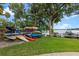 Lawn leading to kayak storage and boat dock, close to the lake at 1100 S Orlando Ave # 206, Maitland, FL 32751
