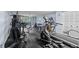 Well-equipped gym with modern machines and natural light, promoting a healthy lifestyle at 1100 S Orlando Ave # 206, Maitland, FL 32751
