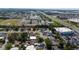 An aerial image showing the property's location near commercial and retail areas at 1105 Arrowsmith Ave, Orlando, FL 32809