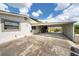 Spacious carport with a sturdy metal roof, ideal for vehicle protection and storage at 1105 Arrowsmith Ave, Orlando, FL 32809