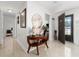 Inviting foyer with stylish decor, elegant table, and well-lit entrance showcasing the home's charm at 1105 Arrowsmith Ave, Orlando, FL 32809