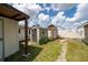 Well-maintained outdoor shed with a shingled roof, perfect for storage at 1105 Arrowsmith Ave, Orlando, FL 32809