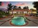 Gorgeous backyard with a sparkling pool, lush landscaping, and a spacious patio, perfect for outdoor enjoyment at 1351 N Classic Ct, Longwood, FL 32779