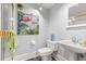 Charming powder room featuring unique flamingo art and stylish fixtures at 1351 N Classic Ct, Longwood, FL 32779