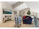 Cozy bonus room with vaulted ceilings, a comfortable sofa, and stylish decor, perfect for relaxation at 1351 N Classic Ct, Longwood, FL 32779