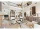 Bright living room with high ceilings, large windows, and elegant furnishings at 1351 N Classic Ct, Longwood, FL 32779