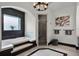 Bright bathroom with a large tub, walk-in shower, and decorative wall art and towels at 1517 Edenhall Pt, Lake Mary, FL 32746