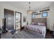 Bedroom features a tray ceiling, walk-in closet, and ensuite bathroom at 1517 Edenhall Pt, Lake Mary, FL 32746